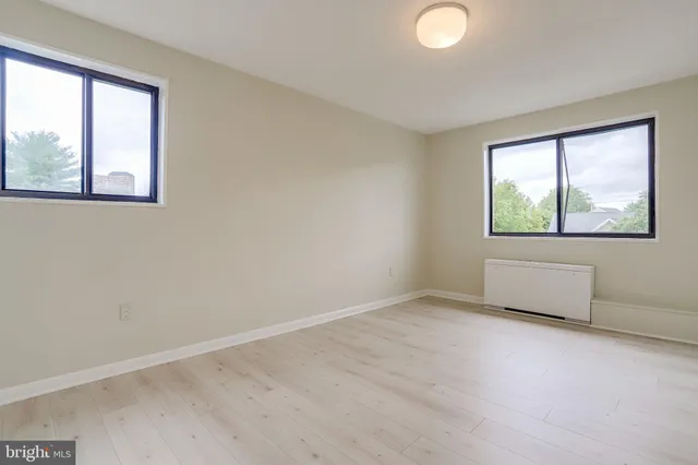 an empty room with windows