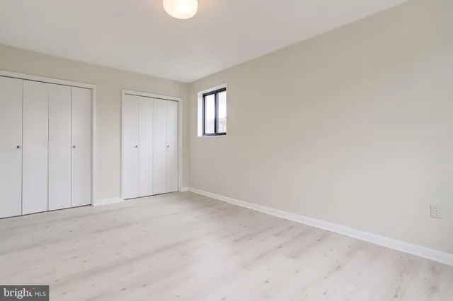 a view of an empty room with window