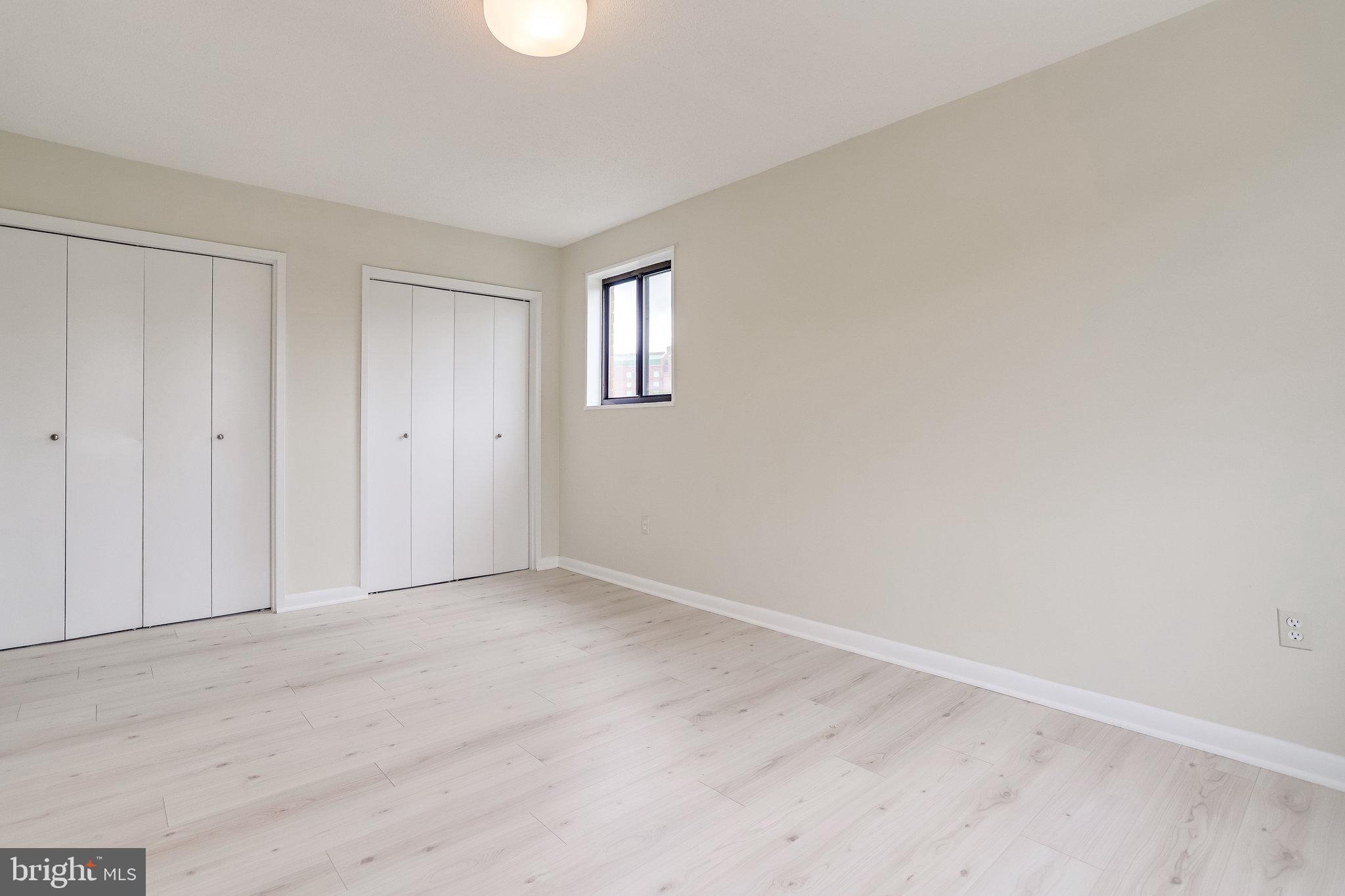 3515 Washington Boulevard, Unit 415 Arlington, VA 22201 - Photo 46 of 60 a view of an empty room and window