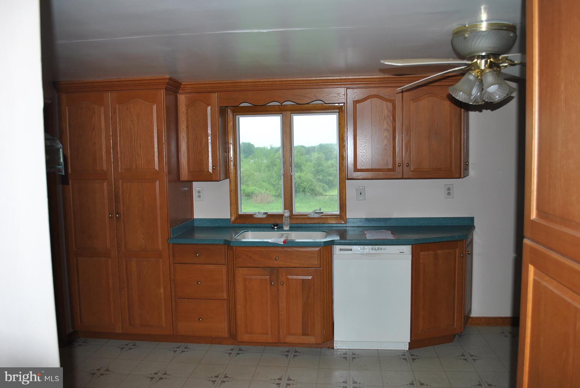 3803 Rockdale Road Manchester, MD 21102 - Photo 11 of 30 a kitchen with a sink and cabinets