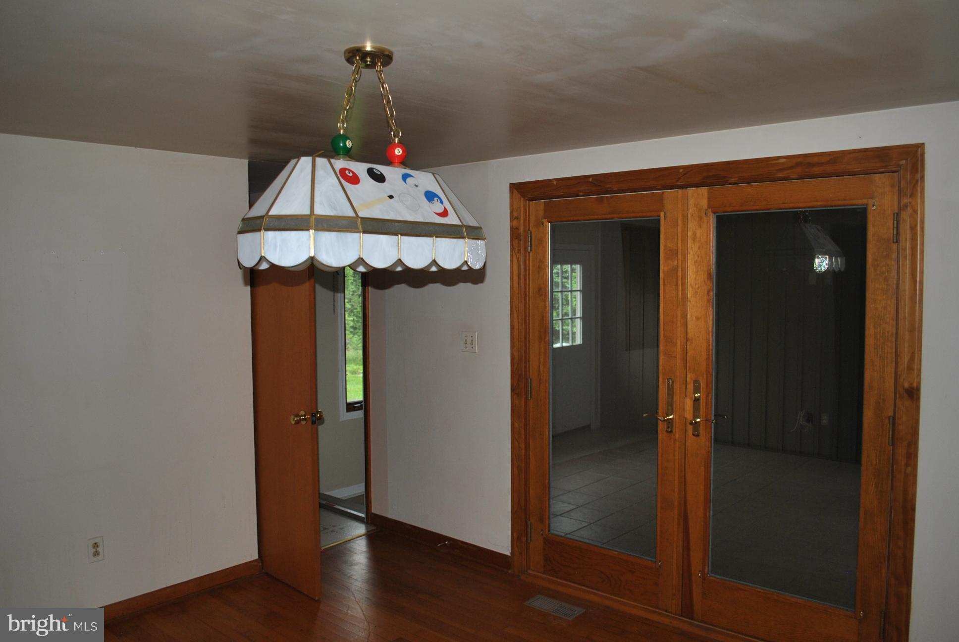 3803 Rockdale Road Manchester, MD 21102 - Photo 14 of 30 a view of a hallway with wooden floor and closet