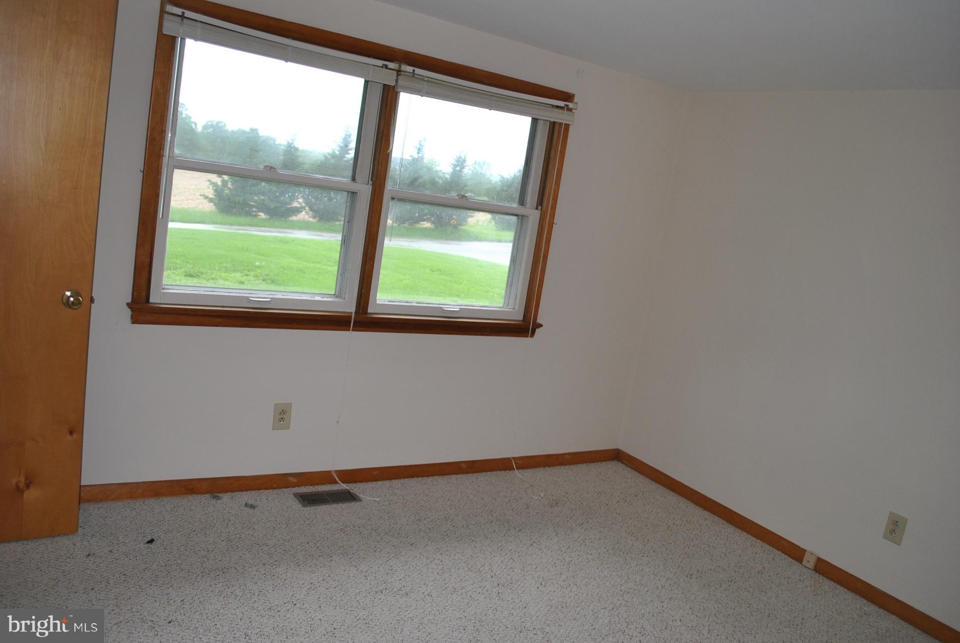 3803 Rockdale Road Manchester, MD 21102 - Photo 22 of 30 an empty room with a window