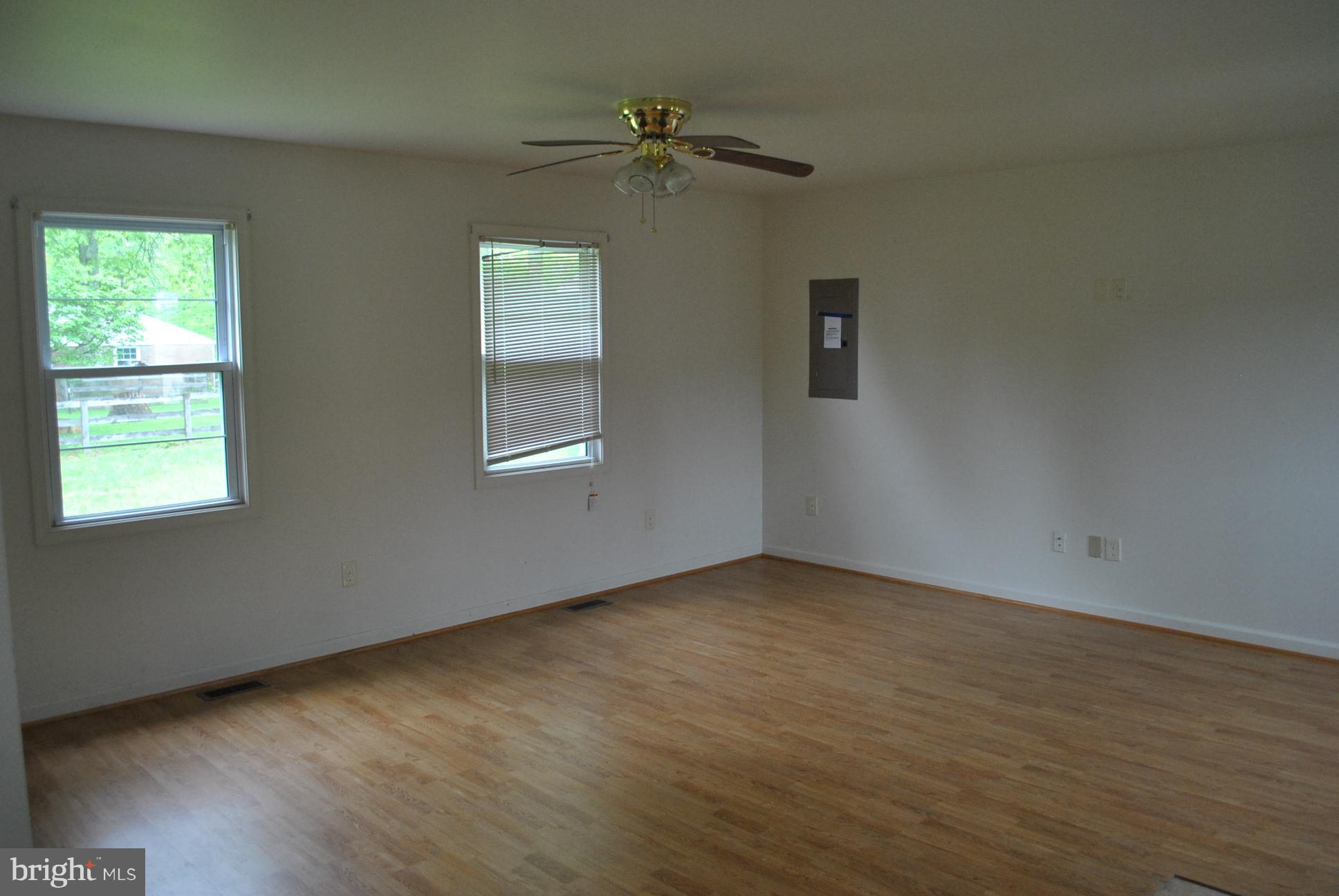 3803 Rockdale Road Manchester, MD 21102 - Photo 30 of 30 wooden floor in an empty room with a window