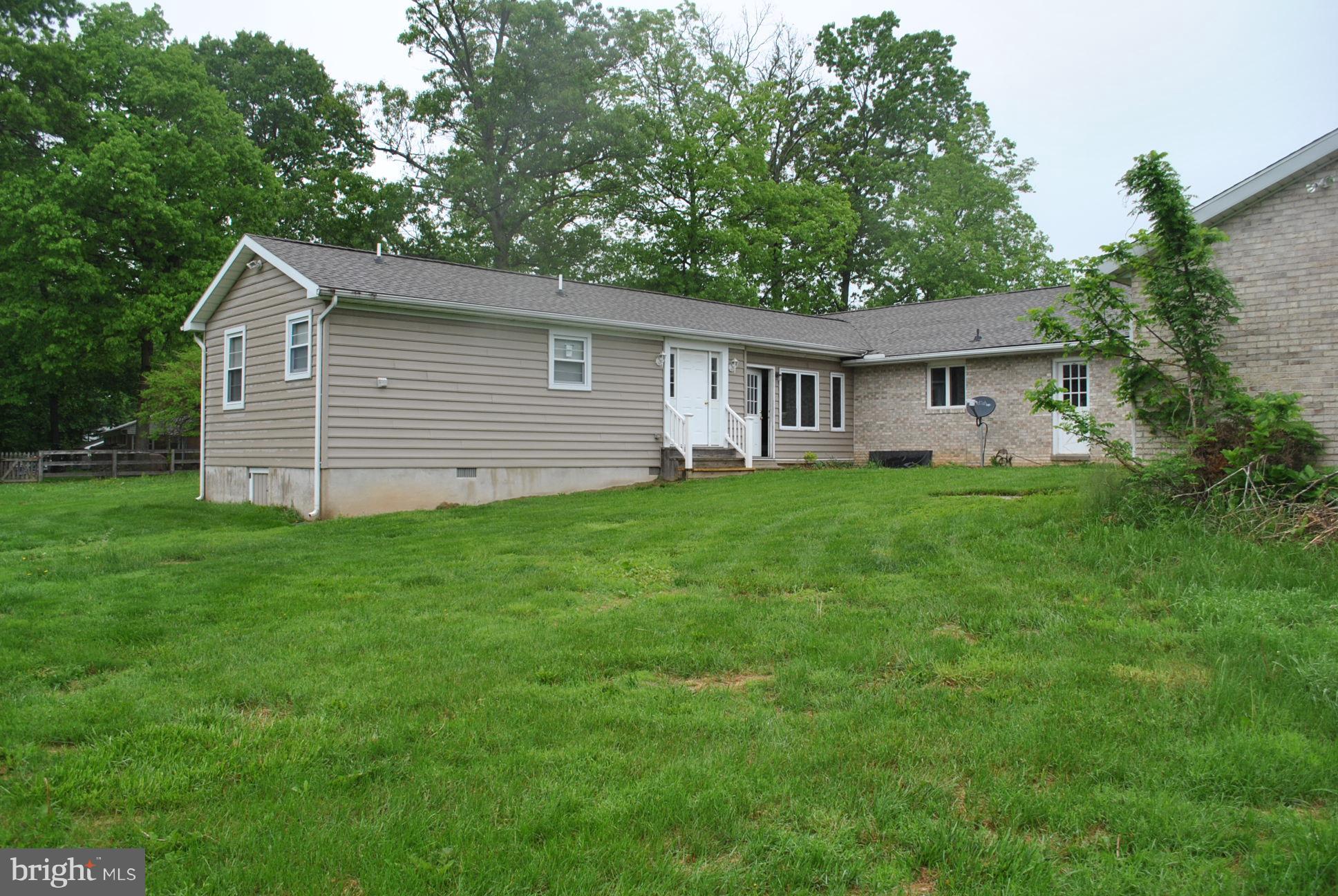 3803 Rockdale Road Manchester, MD 21102 - Photo 5 of 30 a view of a house with a yard