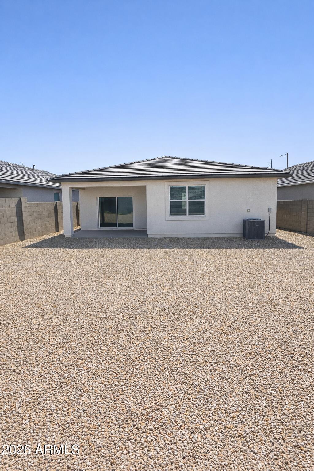 24208 West Ripple Road Buckeye, AZ 85326 - Photo 11 of 11 a front view of house with yard and trees in the background