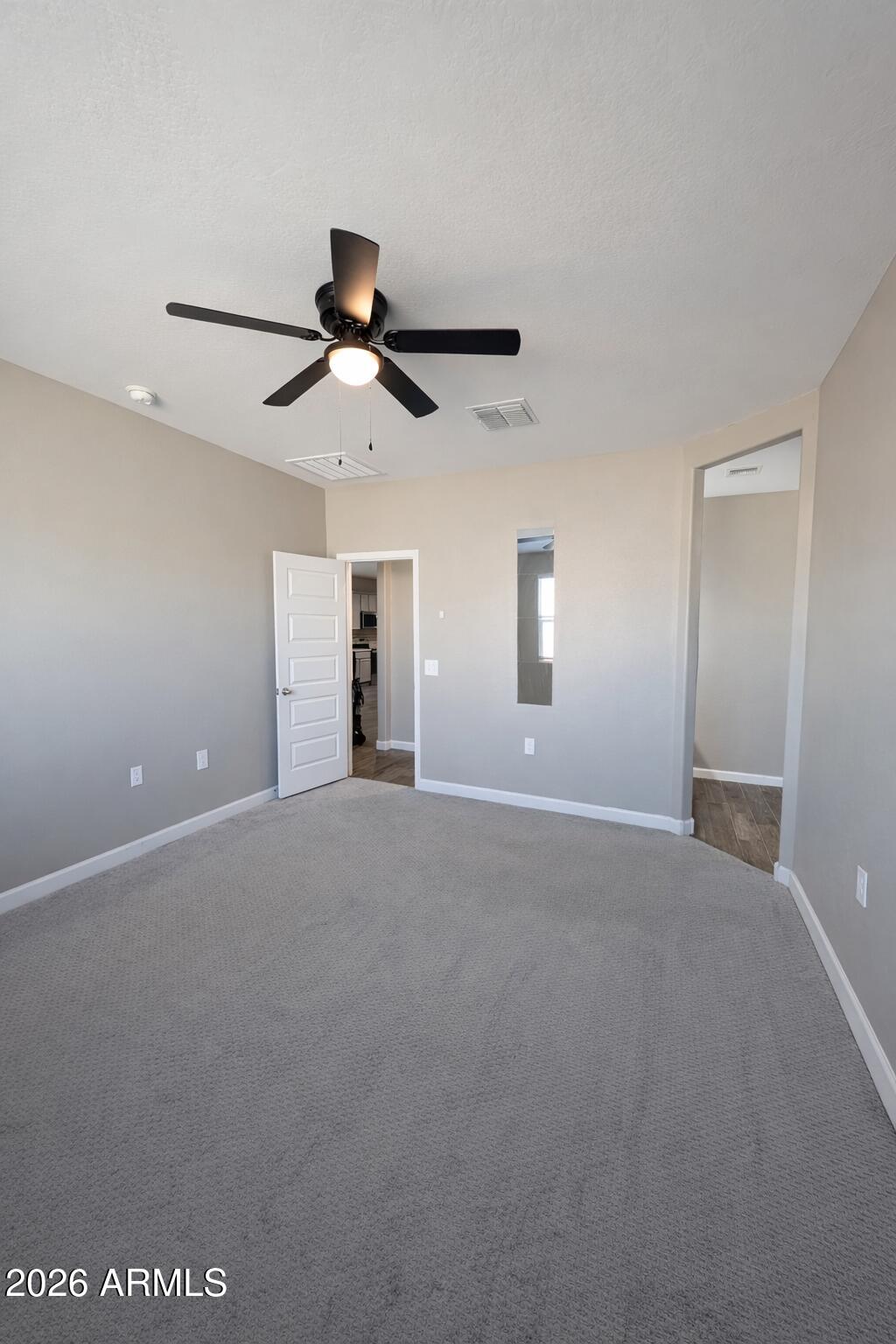 24208 West Ripple Road Buckeye, AZ 85326 - Photo 8 of 11 a view of an empty room