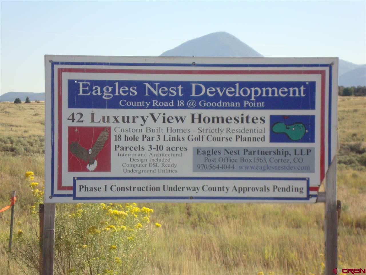 Lot 11 Road 17.9 Cortez Co 81321 Cortez, CO 81321 - Photo 15 of 17 a sign on the side of a building