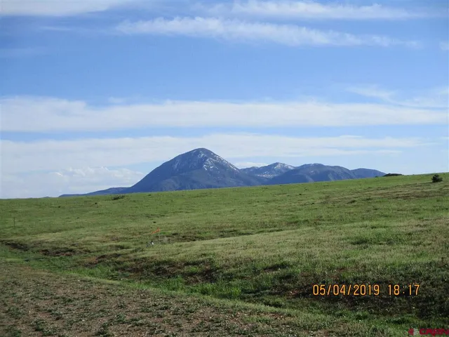 a view of an outdoor space and mountain view
