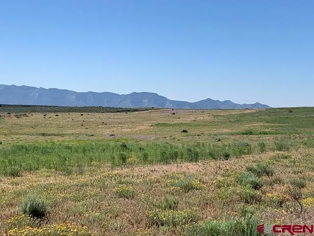 a view of an outdoor space and mountain view