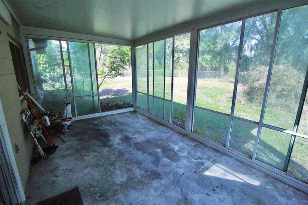 4090 Old Colony Road Mulberry, FL 33860 - Photo 15 of 22 a view of livingroom with floor to ceiling window