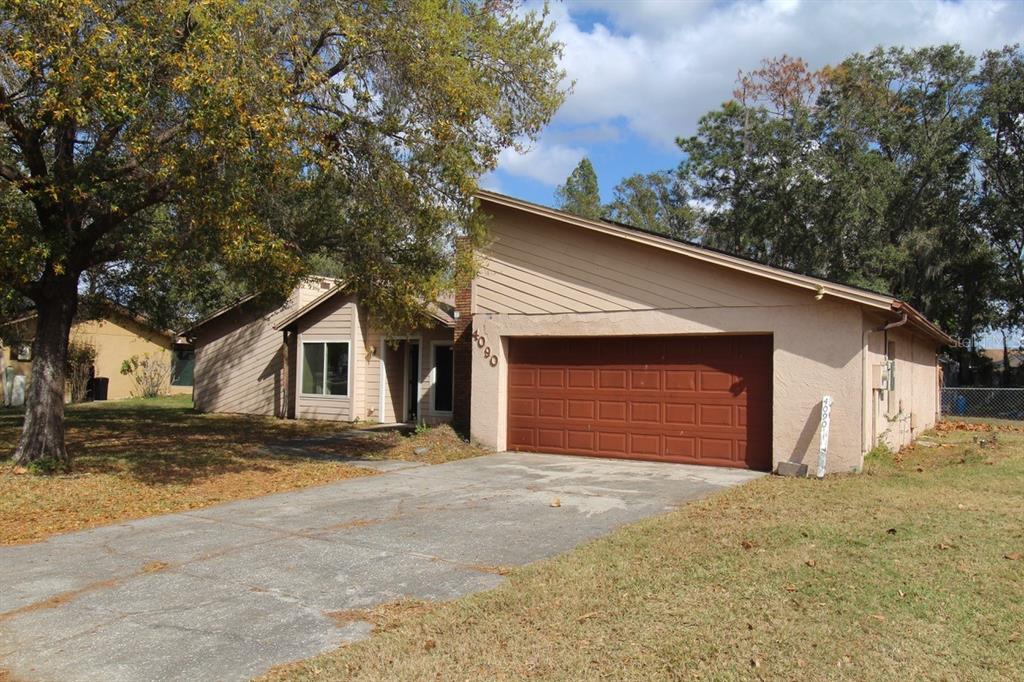 4090 Old Colony Road Mulberry, FL 33860 - Photo 21 of 22 a view of a house with a yard