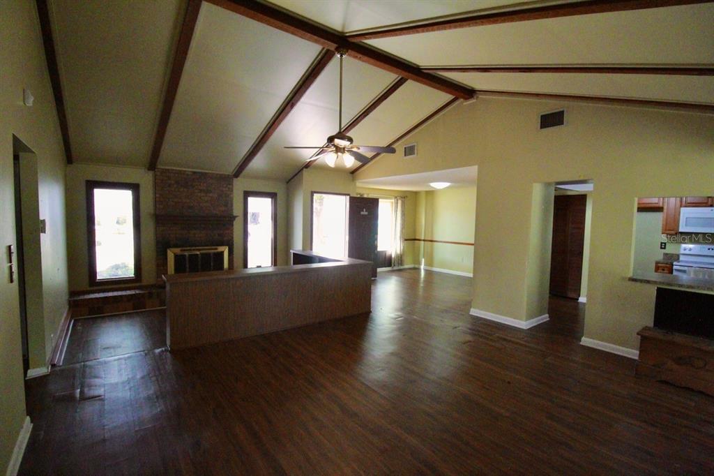 4090 Old Colony Road Mulberry, FL 33860 - Photo 3 of 22 a view of gallery with wooden floor
