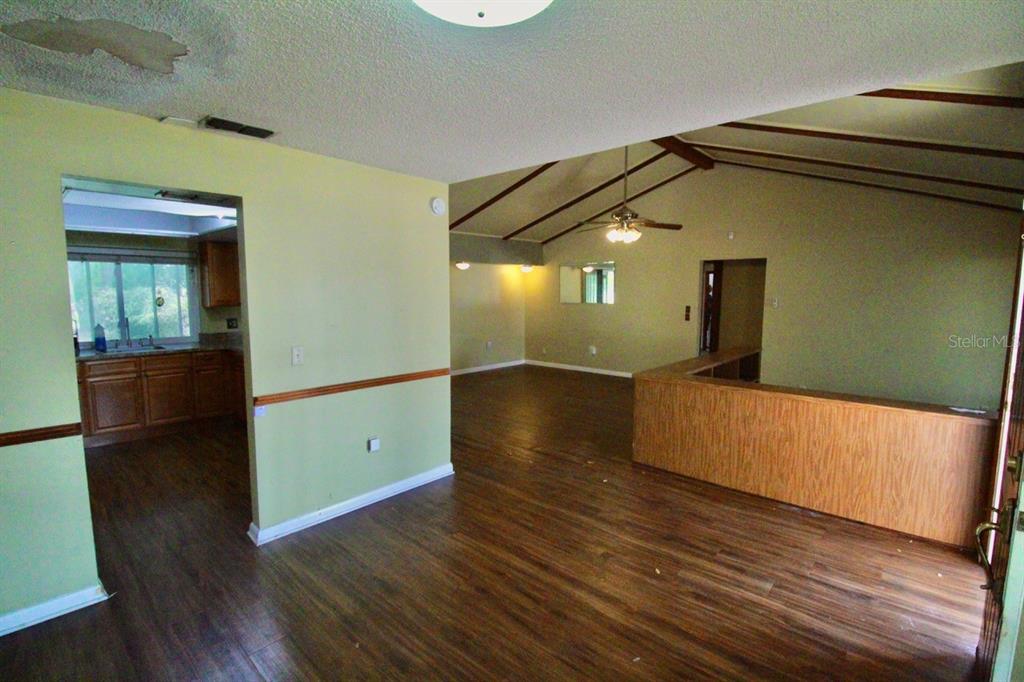 4090 Old Colony Road Mulberry, FL 33860 - Photo 4 of 22 a view of a living room with wooden floor