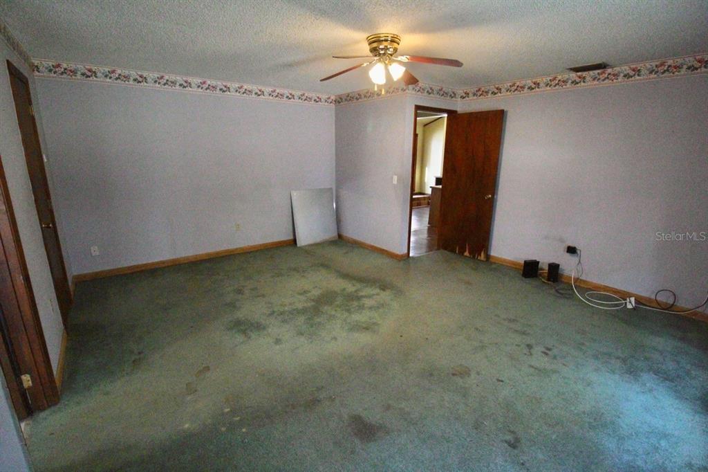 4090 Old Colony Road Mulberry, FL 33860 - Photo 7 of 22 wooden floor in an empty room