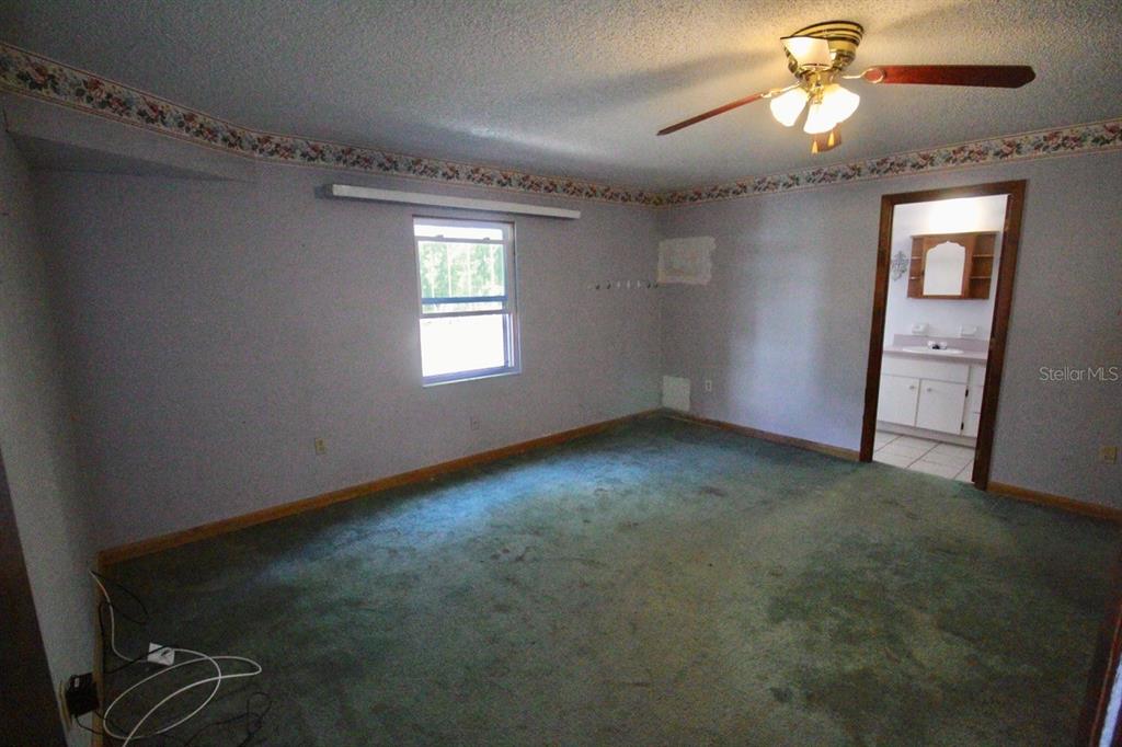 4090 Old Colony Road Mulberry, FL 33860 - Photo 8 of 22 a view of empty room with windows