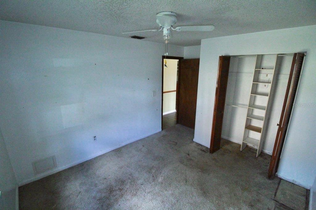 4090 Old Colony Road Mulberry, FL 33860 - Photo 10 of 22 an empty room with windows