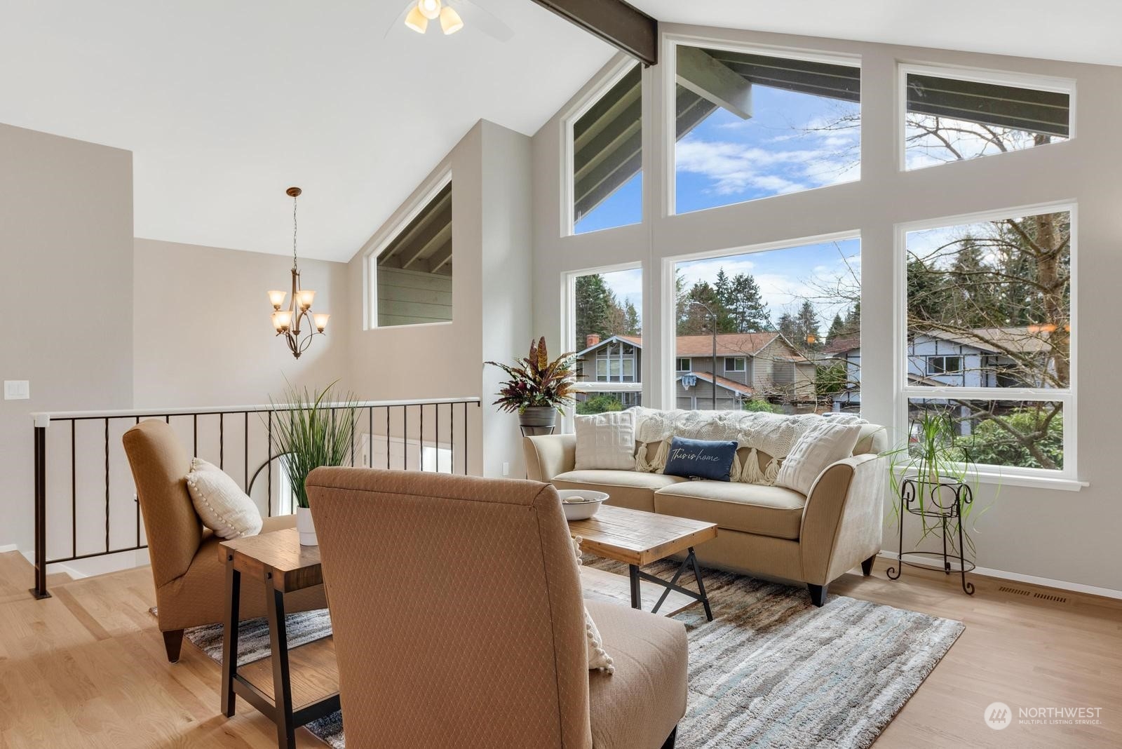 2403 166th Place Southeast Bothell, WA 98012 - Photo 8 of 29 a living room with furniture and a large window