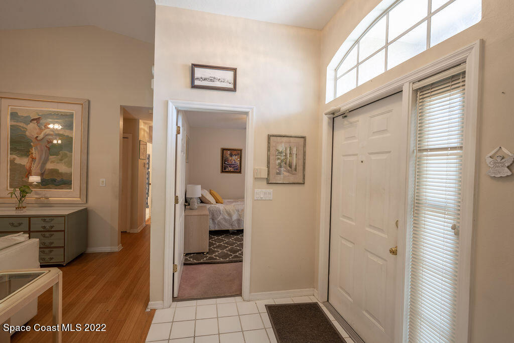 1190 Meadowbrook Road Northeast Palm Bay, FL 32905 - Photo 7 of 27 a bathroom with a sink and a mirror
