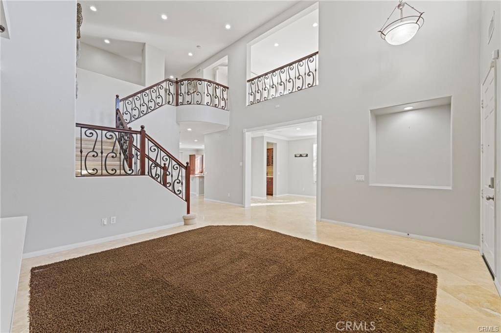 8634 Hunt Canyon Road Corona, CA 92883 - Photo 10 of 31 a view of a hallway with stairs