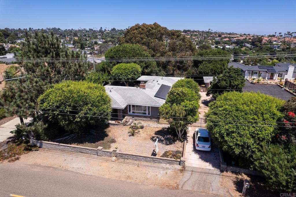 4340 Highland Drive Carlsbad, CA 92008 - Photo 15 of 28 an aerial view of a house with a yard and street view