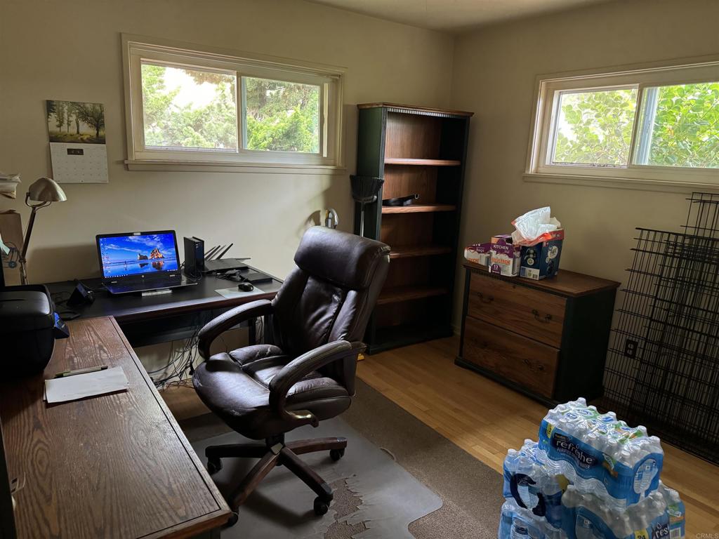 4340 Highland Drive Carlsbad, CA 92008 - Photo 25 of 28 a living room with furniture and a window