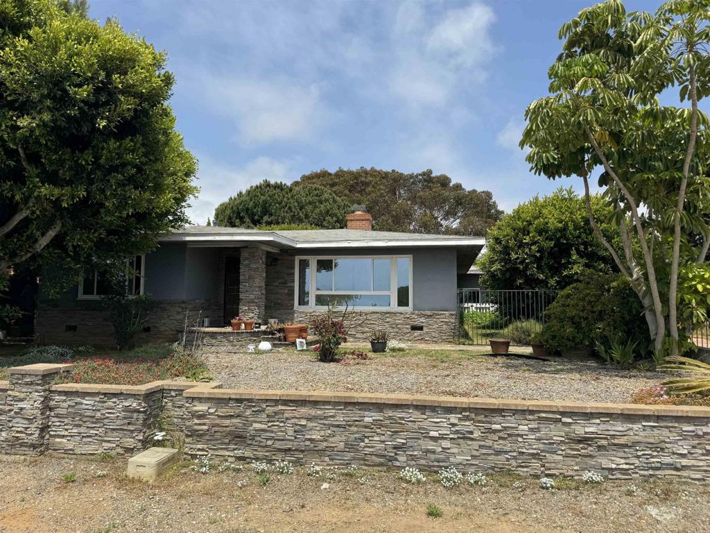 4340 Highland Drive Carlsbad, CA 92008 - Photo 5 of 28 a view of a house with a patio