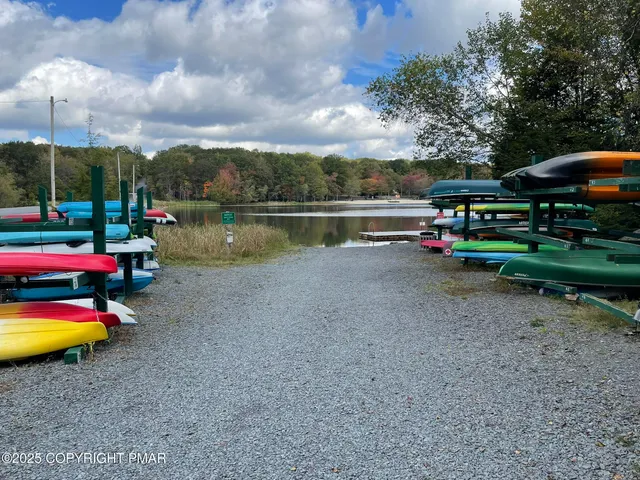 a childrens park with lots of swings and slides