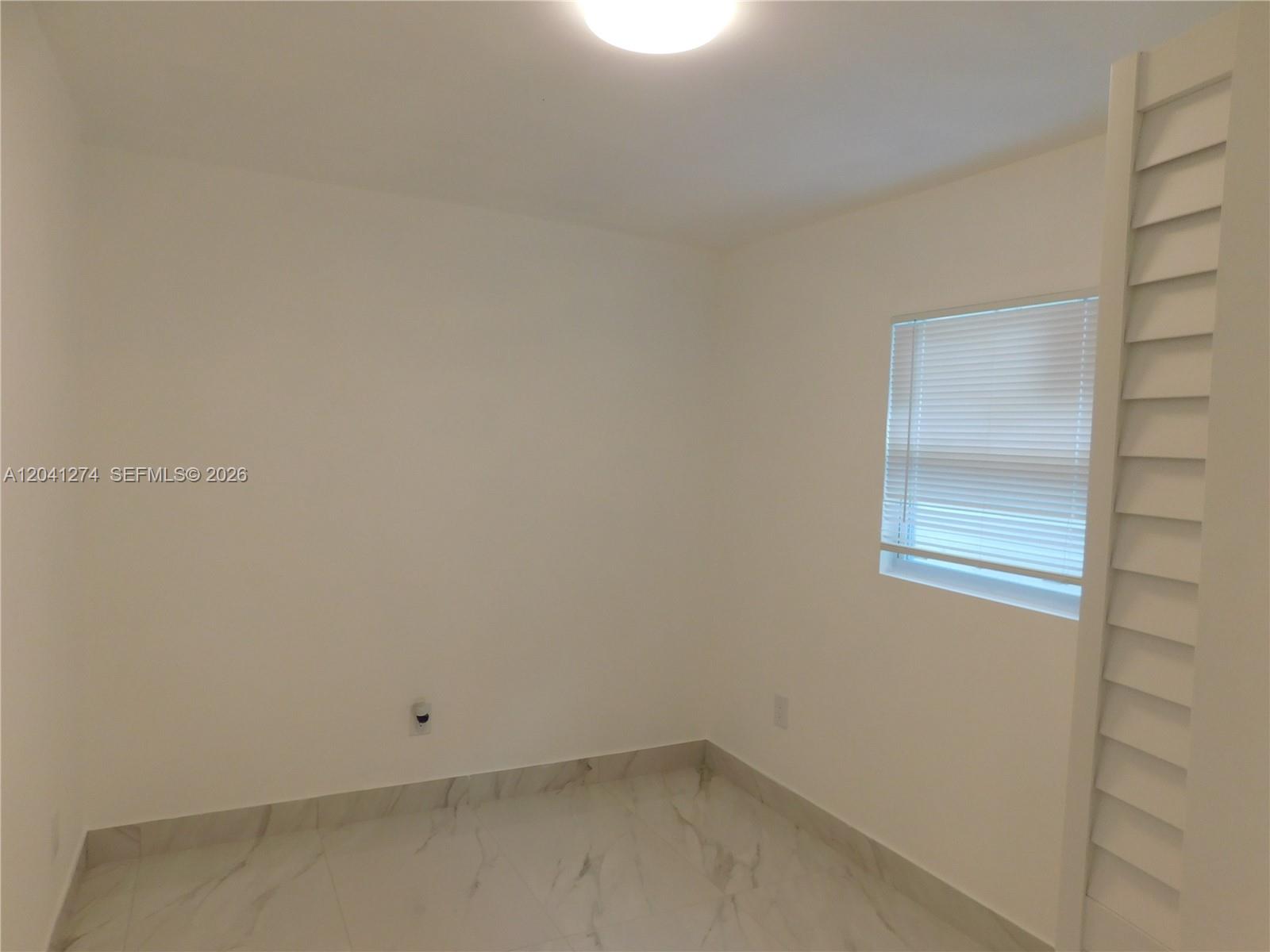 2230 Northwest 58th Street, Unit B Miami, FL 33142 - Photo 14 of 18 a view of a small space
