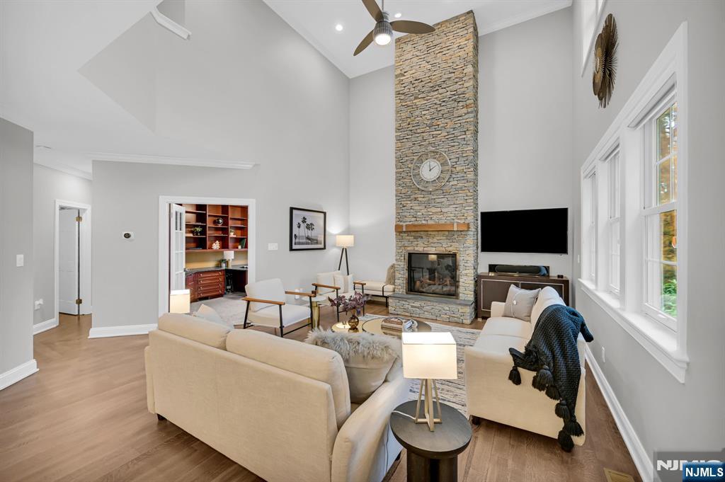 3 Brook Ridge Court Cedar Grove, NJ 07009 - Photo 14 of 49 a living room with furniture and a flat screen tv