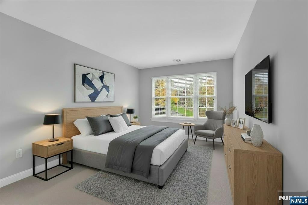 3 Brook Ridge Court Cedar Grove, NJ 07009 - Photo 30 of 49 a bedroom with bed couch and window