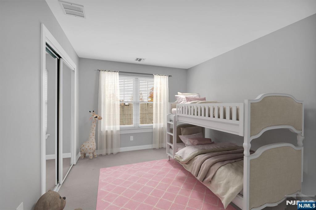 3 Brook Ridge Court Cedar Grove, NJ 07009 - Photo 32 of 49 a bedroom with a bed and a window