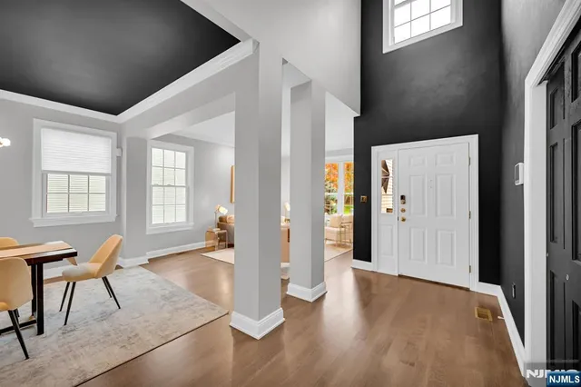 a view of a livingroom with furniture and wooden floor