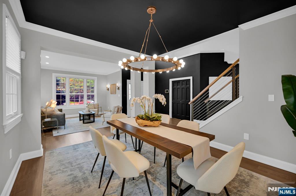 3 Brook Ridge Court Cedar Grove, NJ 07009 - Photo 8 of 49 a dining room with furniture and wooden floor