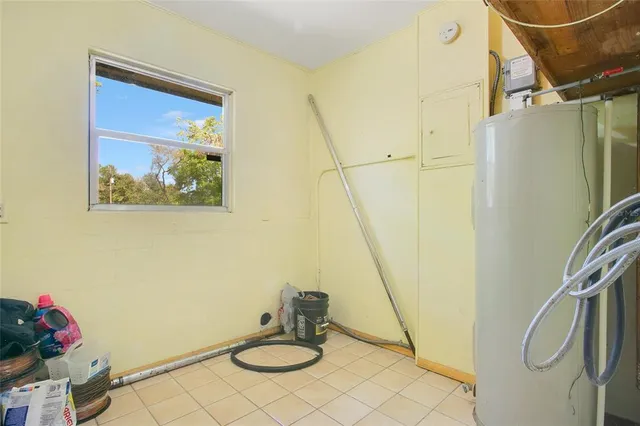 a bathroom with a sink mirror and a shower