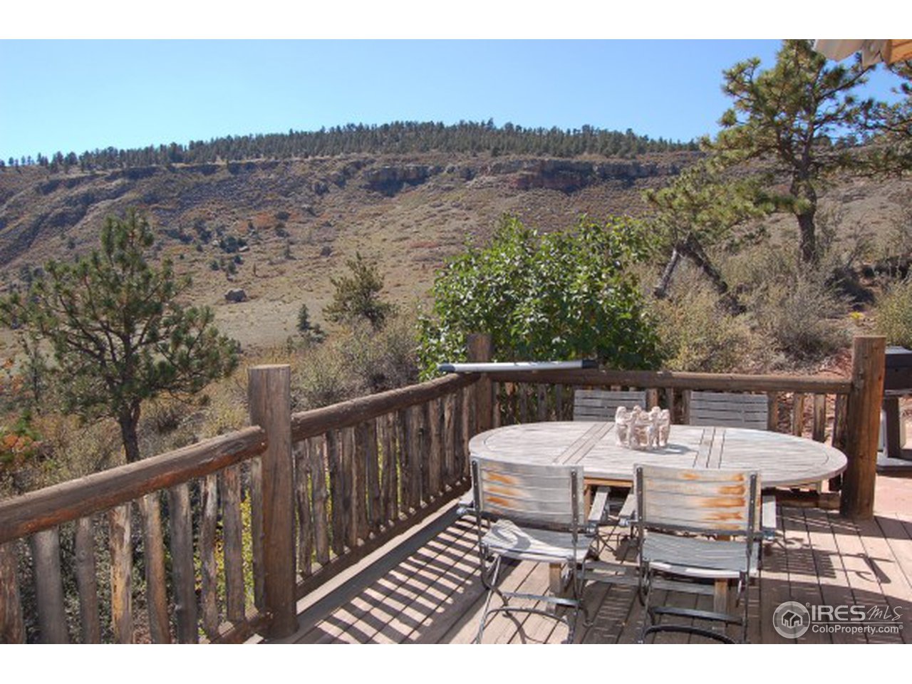 1016 Vision Way Lyons, CO 80540 - Photo 8 of 13 a view of a balcony with mountain view