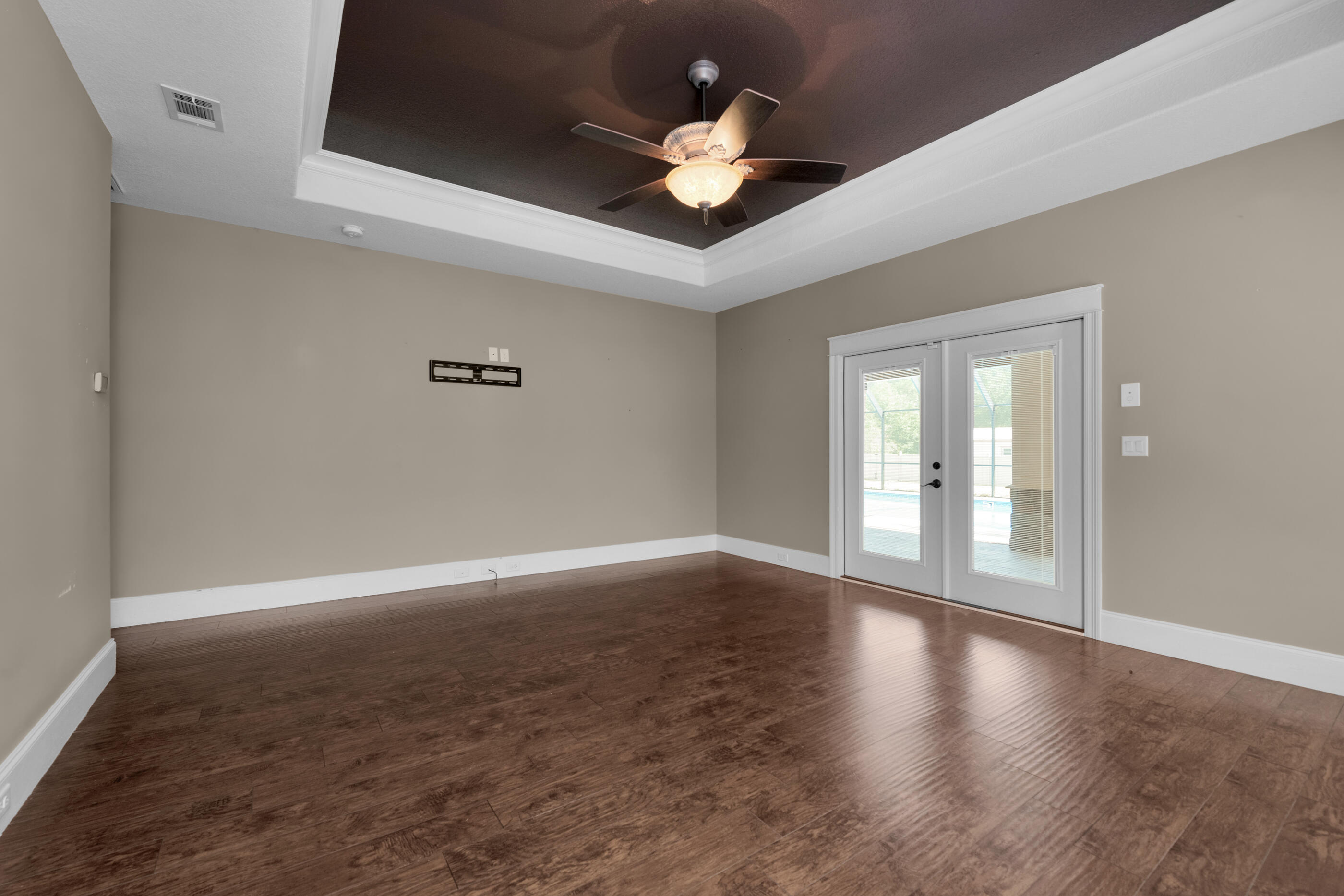 5601 Old River Road Baker, FL 32531 - Photo 16 of 45 wooden floor in an empty room with a window