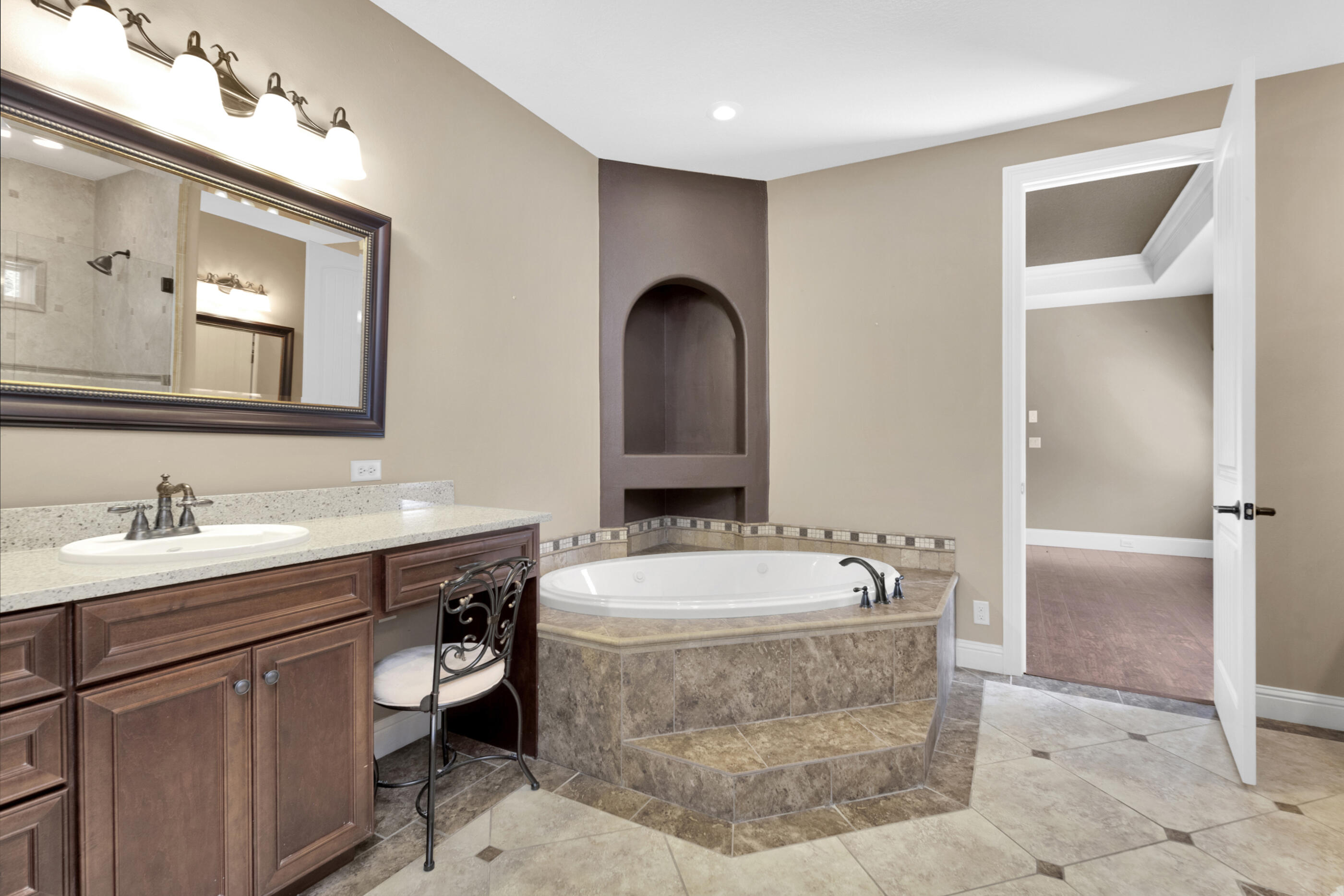 5601 Old River Road Baker, FL 32531 - Photo 19 of 45 a en suite bathroom with a double vanity sink and a mirror