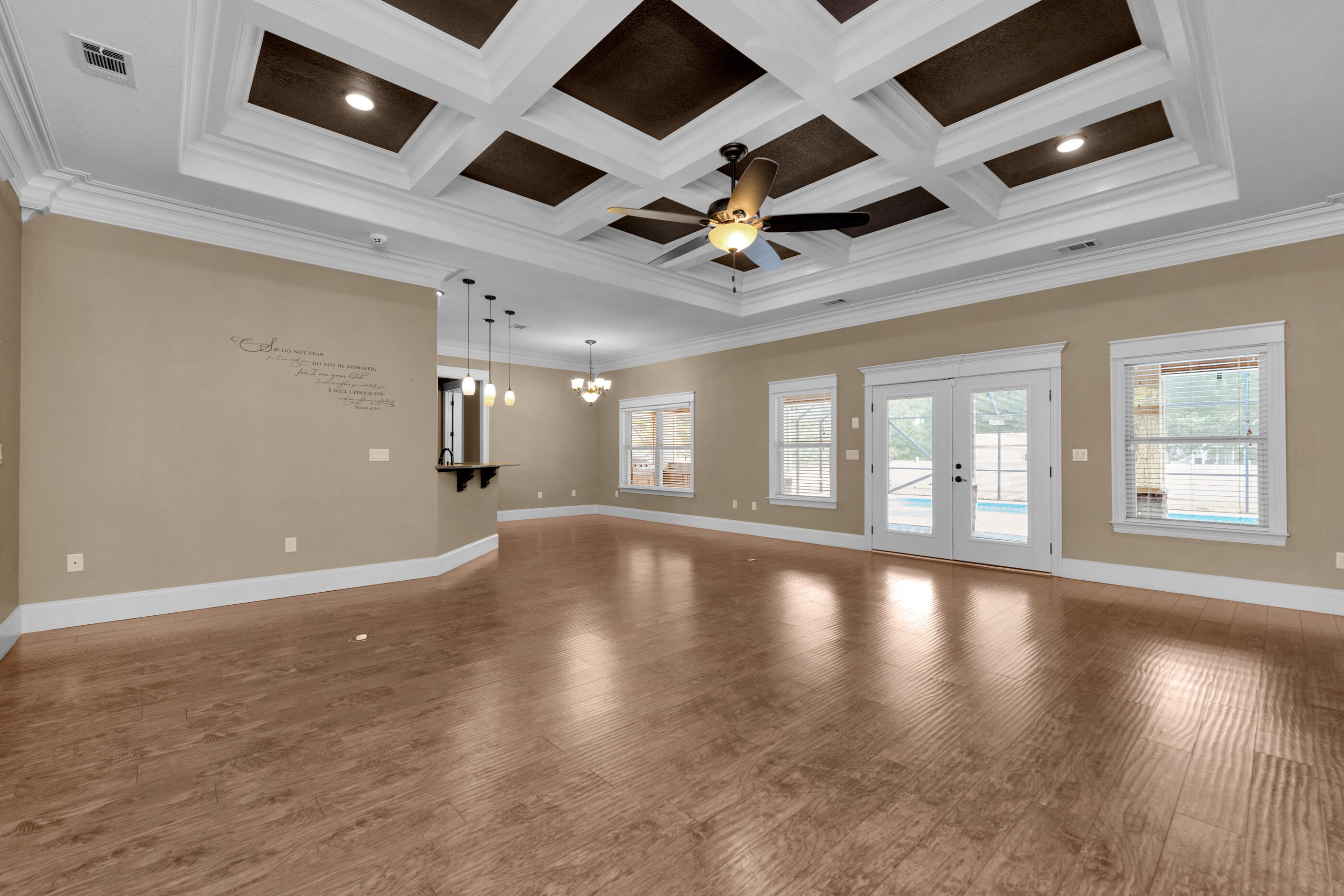 5601 Old River Road Baker, FL 32531 - Photo 8 of 45 a view of an empty room with wooden floor and a window