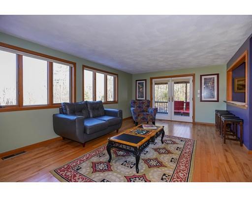 371 Sargent Road Boxborough, MA 01719 - Photo 11 of 30 a living room with furniture and a wooden floor