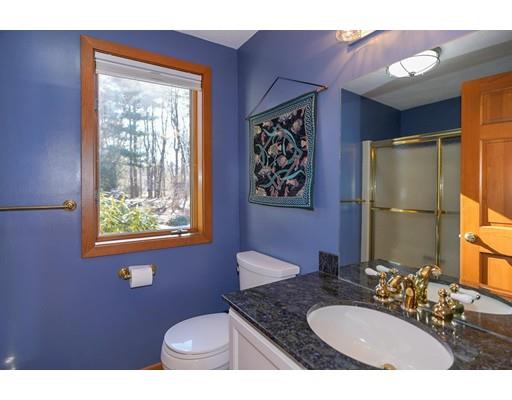 371 Sargent Road Boxborough, MA 01719 - Photo 15 of 30 a bathroom with a granite countertop sink and a mirror