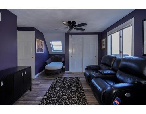371 Sargent Road Boxborough, MA 01719 - Photo 19 of 30 a living room with furniture and a rug