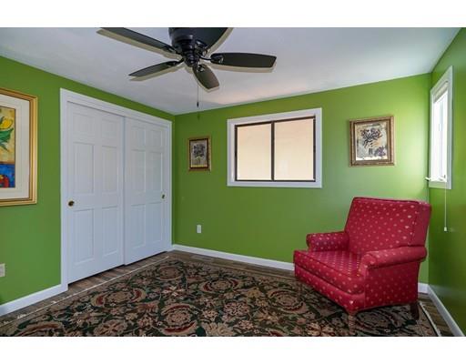 371 Sargent Road Boxborough, MA 01719 - Photo 20 of 30 a living room with furniture and a window