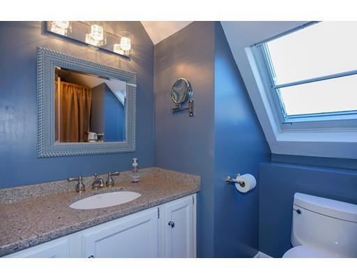 371 Sargent Road Boxborough, MA 01719 - Photo 21 of 30 a bathroom with a granite countertop sink a mirror and a toilet