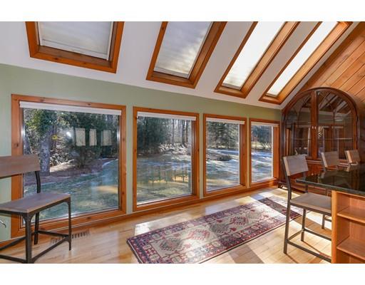 371 Sargent Road Boxborough, MA 01719 - Photo 7 of 30 a living room with furniture and a floor to ceiling window