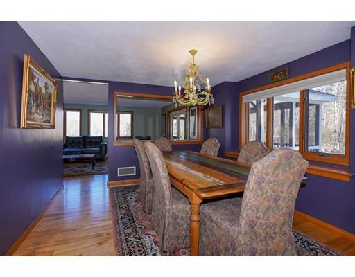 371 Sargent Road Boxborough, MA 01719 - Photo 8 of 30 a living room with furniture a chandelier and a dining table