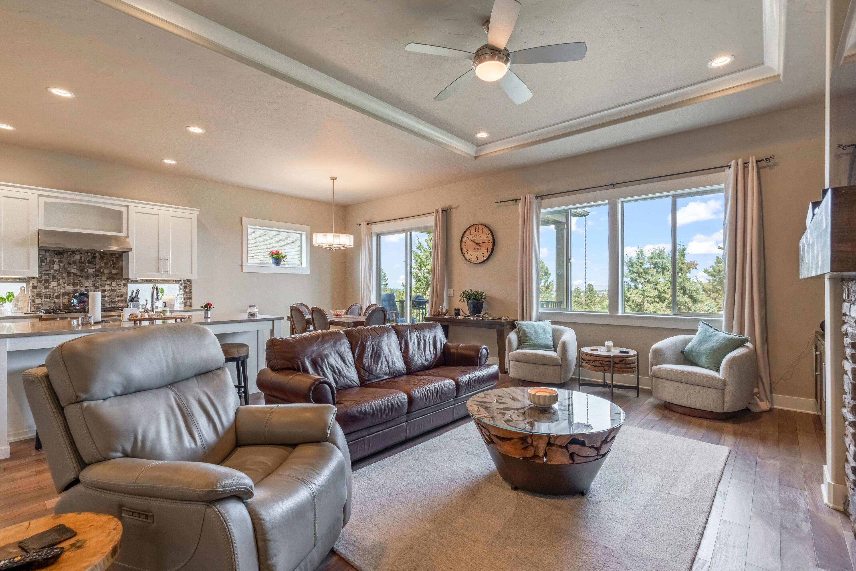 2375 Northwest Majestic Ridge Drive Bend, OR 97703 - Photo 3 of 28 a living room with furniture and a large window