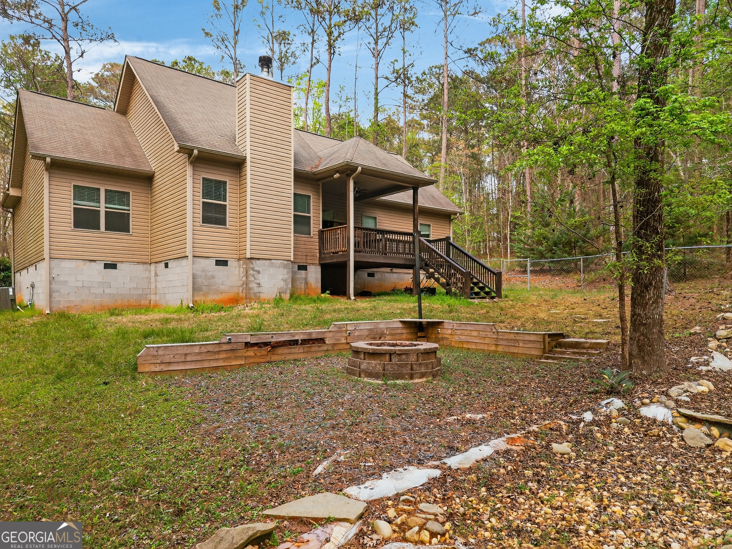 39 Crow Court Monticello, GA 31064 - Photo 12 of 39 a front view of a house with garden