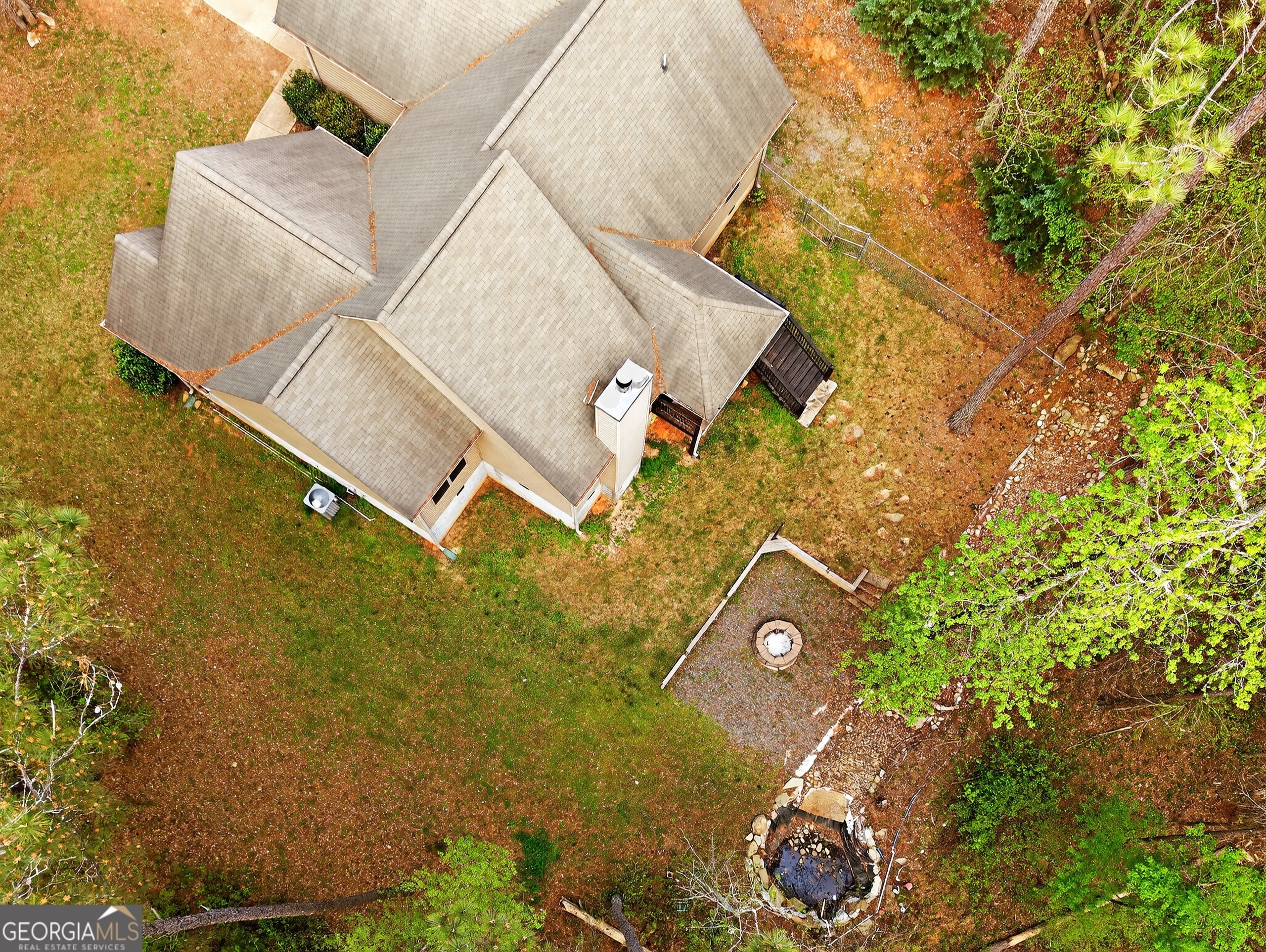 39 Crow Court Monticello, GA 31064 - Photo 13 of 39 an aerial view of a house with a yard and parking space