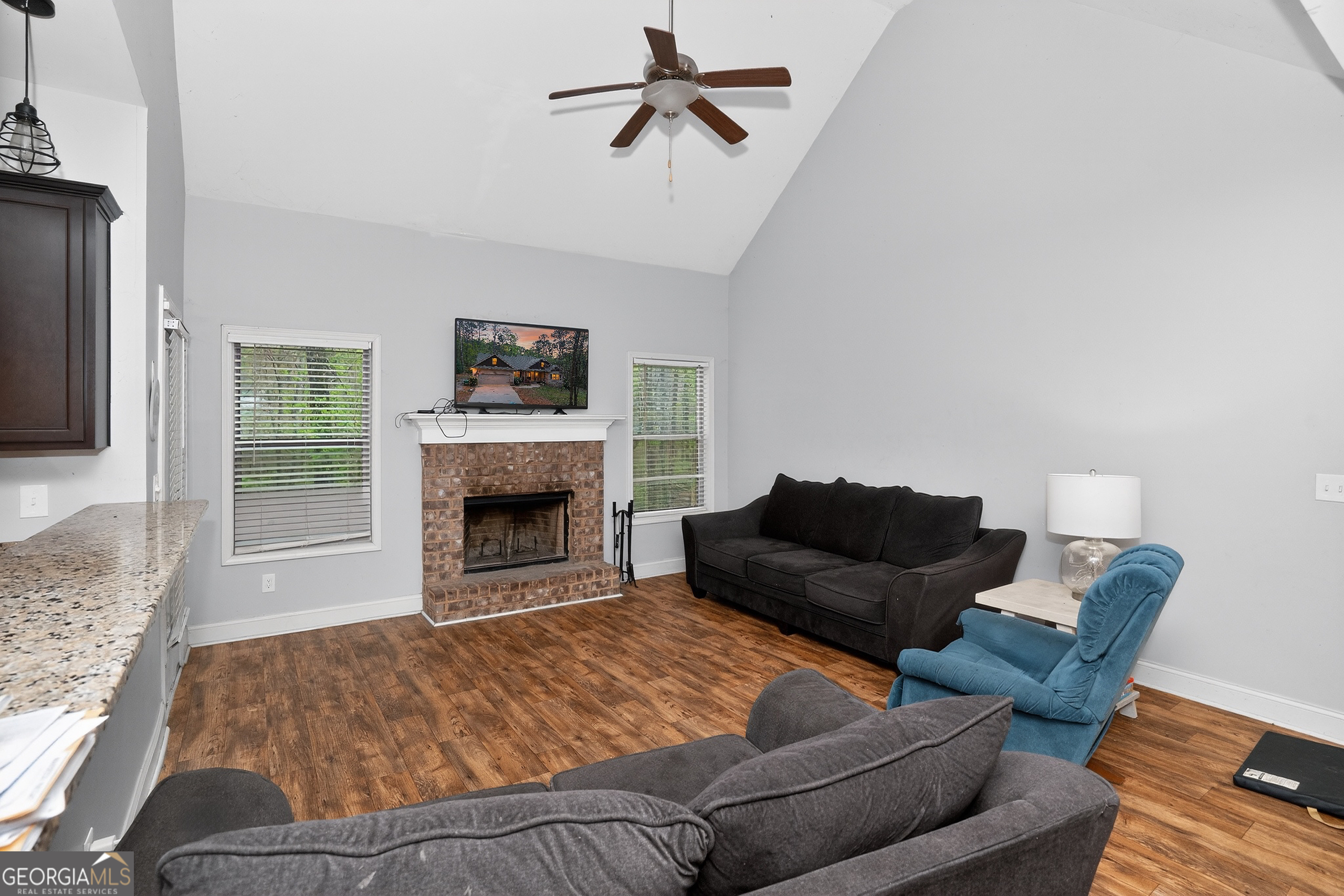 39 Crow Court Monticello, GA 31064 - Photo 17 of 39 a living room with furniture and a fireplace