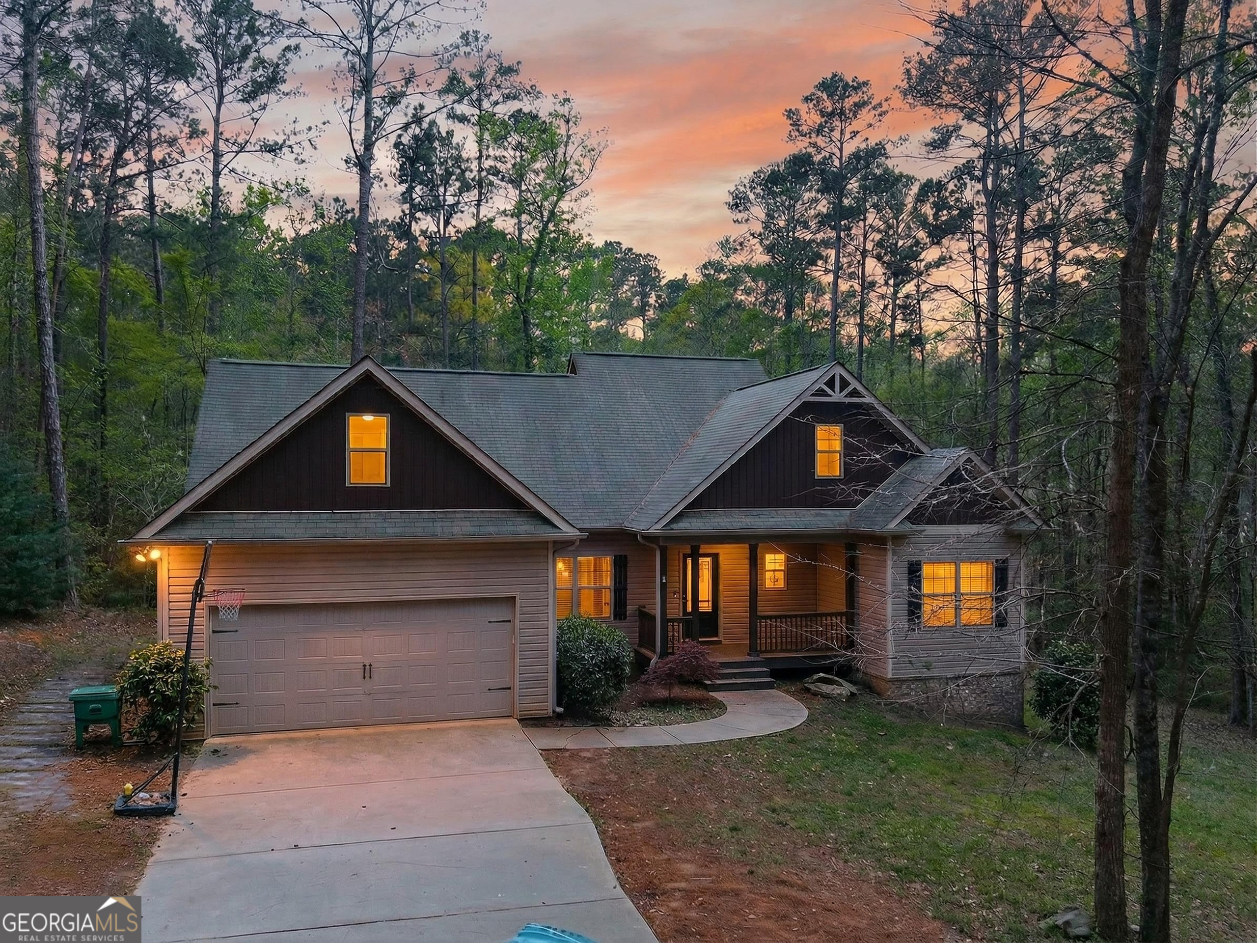 39 Crow Court Monticello, GA 31064 - Photo 2 of 39 a front view of a house with garden